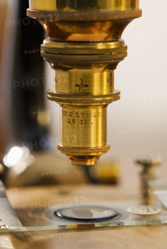 Close up of old fashioned microscope.