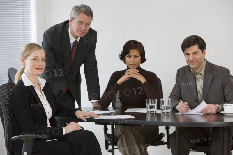 Group of businesspeople in meeting.