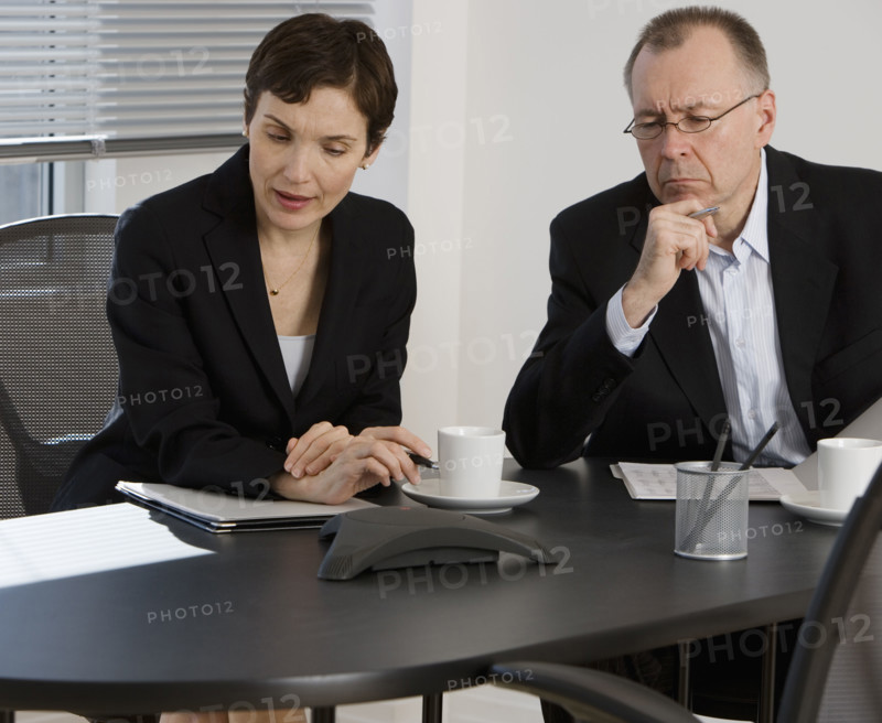 Businesspeople having teleconference.