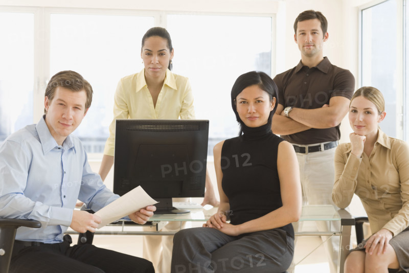 Portrait of businesspeople in office.