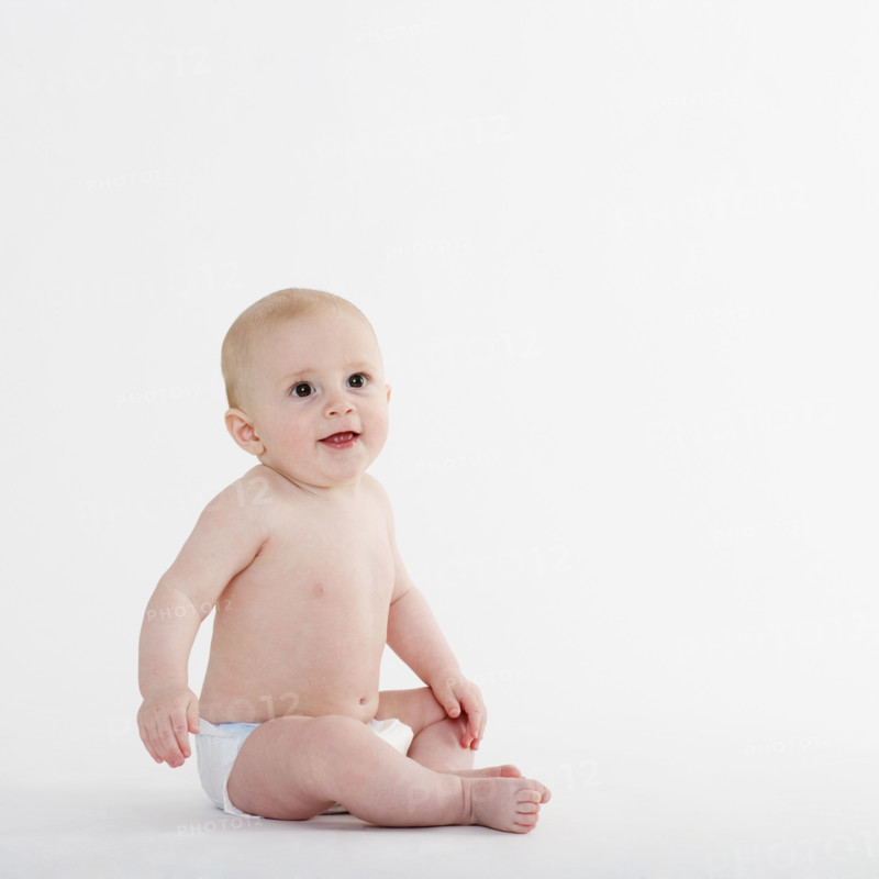 Studio shot of baby in diaper.