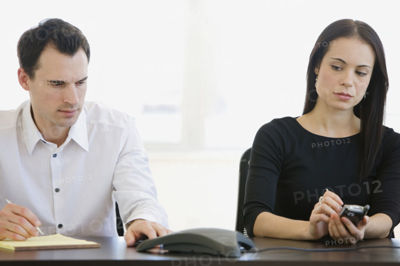 Businesspeople having teleconference.