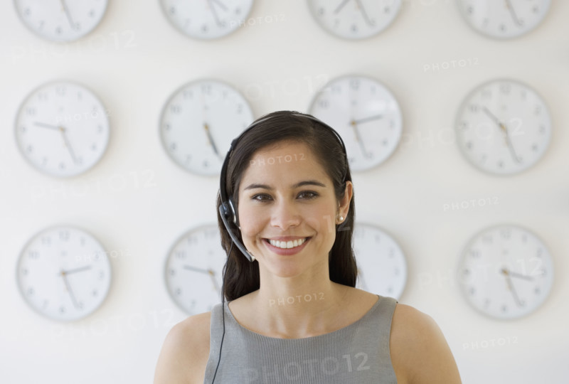 Businesswoman wearing headset.