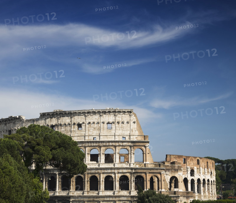 The Colosseum under blue sky, Italy.