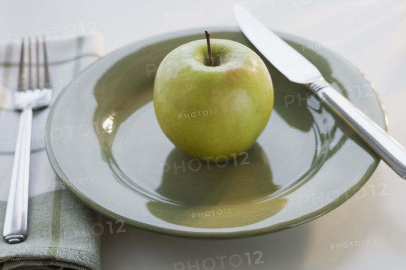 Apple on plate.