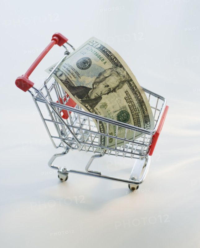 Twenty Dollar bill in shopping cart.
