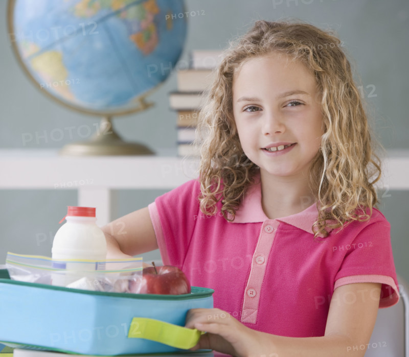 Girl eating lunch at school.