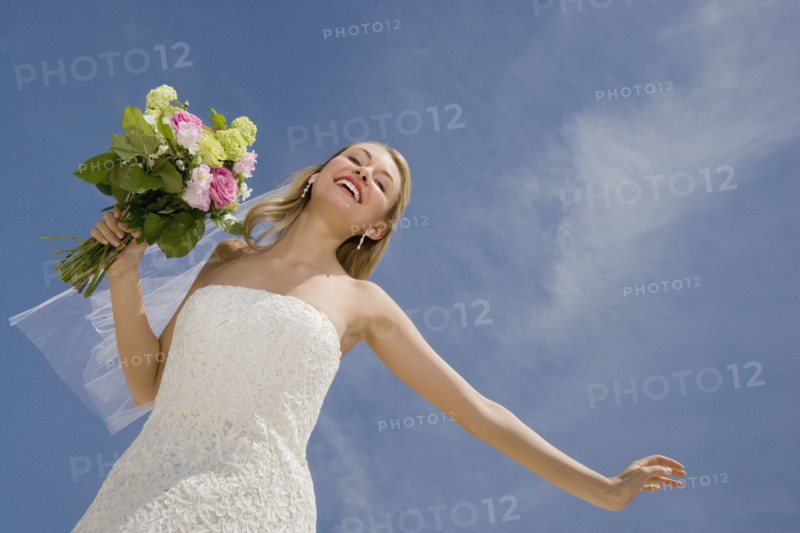 Low angle view of bride.