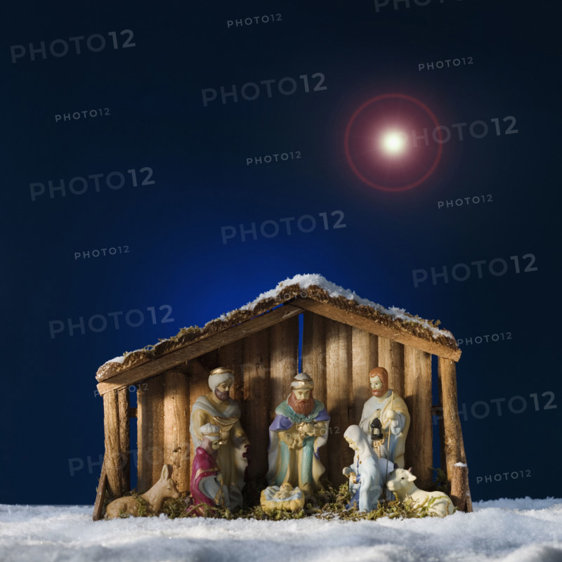 Creche under star in sky.