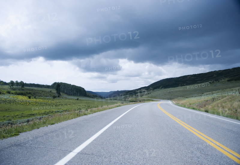 Storm clouds over Route 145 outside Telluride Colorado USA. Date : 2006