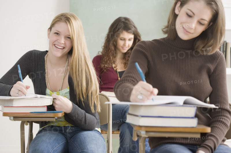 Female students working in classroom. Date : 2007