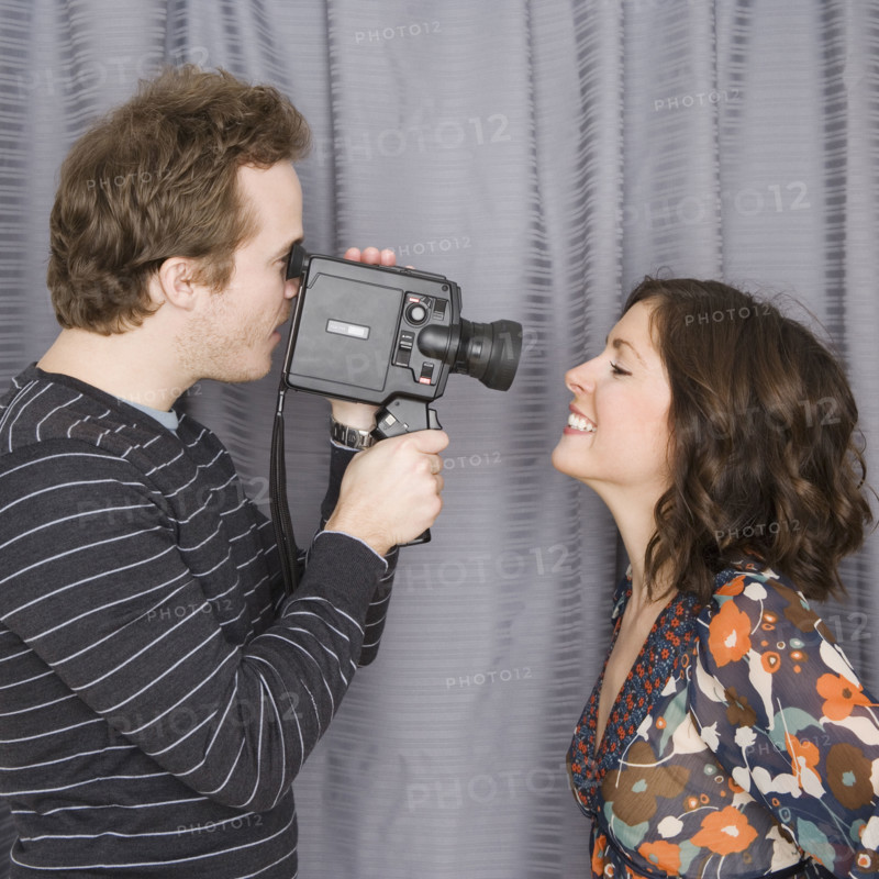 Man video recording girlfriend’s face. Date : 2007