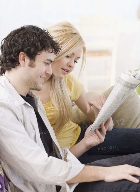 Couple reading newspaper. Date : 2007