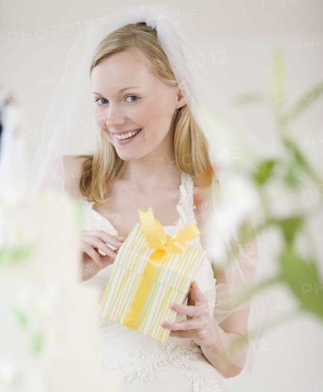 Bride holding gift. Date : 2007