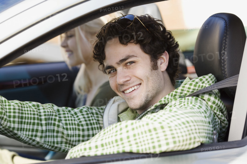 Man sitting in driver’s side of car. Date : 2007