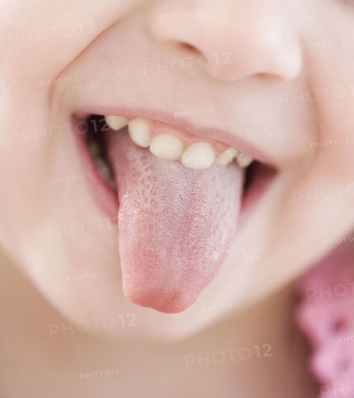 Close up of girl sticking out tongue. Date : 2007
