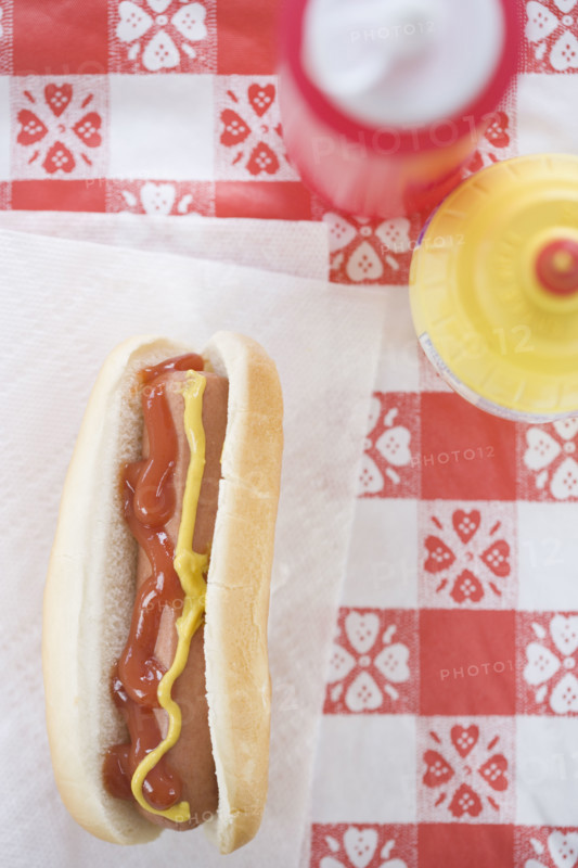 High angle view of hot dog with ketchup and mustard. Date : 2006