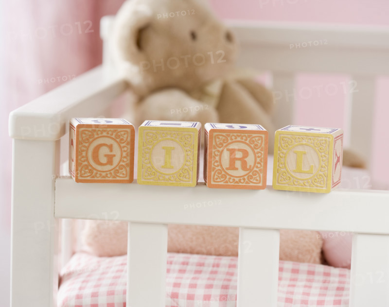 Girl spelled out with blocks on crib. Date : 2007