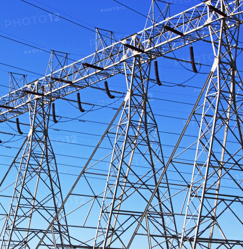 Low angle view of electrical poles. Date : 2007