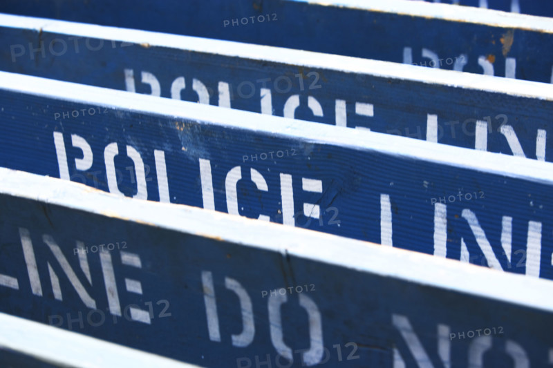 Row of Police Line barriers. Date : 2007
