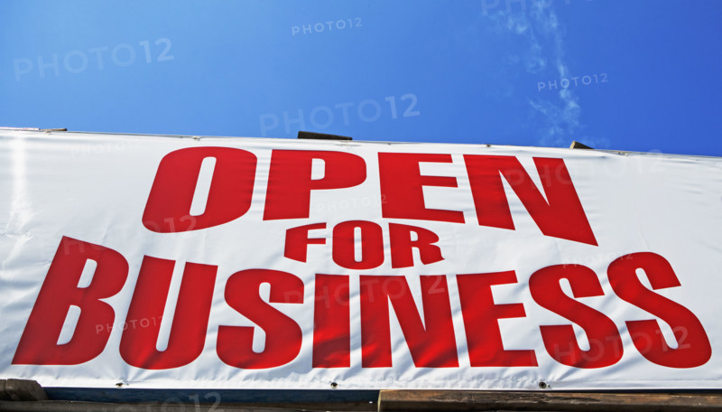 Low angle view of Open for Business sign. Date : 2007
