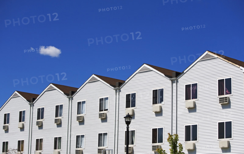 Row houses under blue sky. Date : 2007