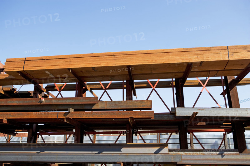 Lumber and metal stacked at construction site. Date : 2007
