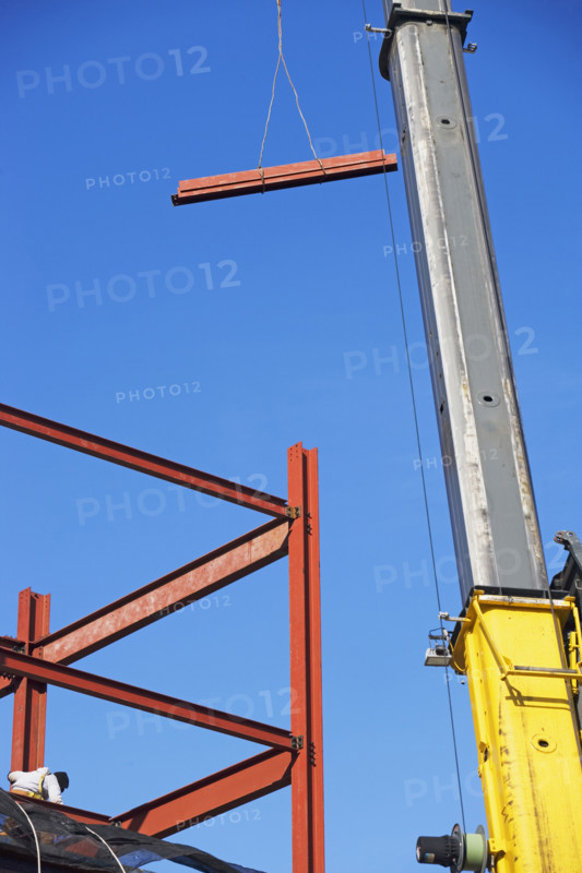Crane holding steel girder. Date : 2007