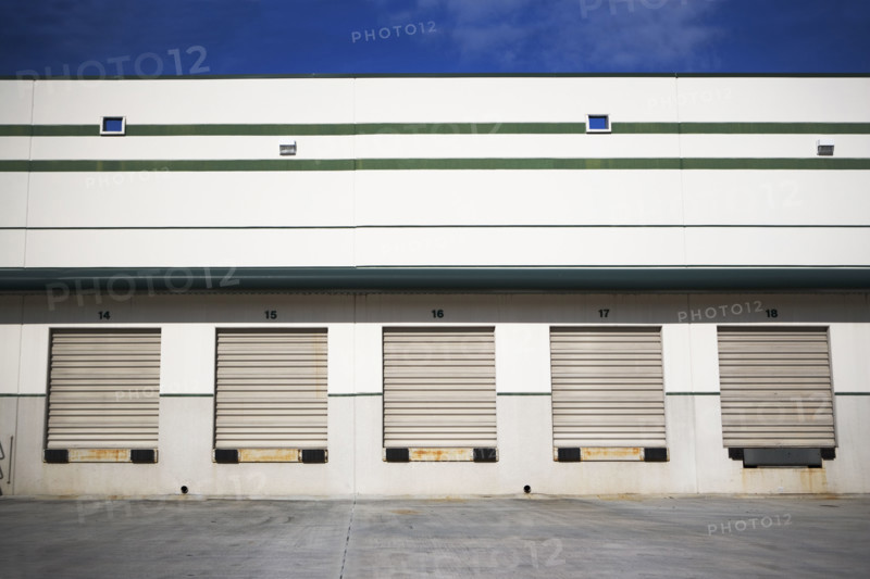 Row of closed loading docks. Date : 2007