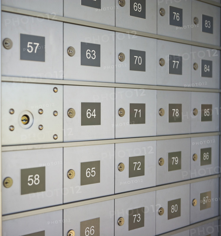 Wall of numbered mailboxes. Date : 2007