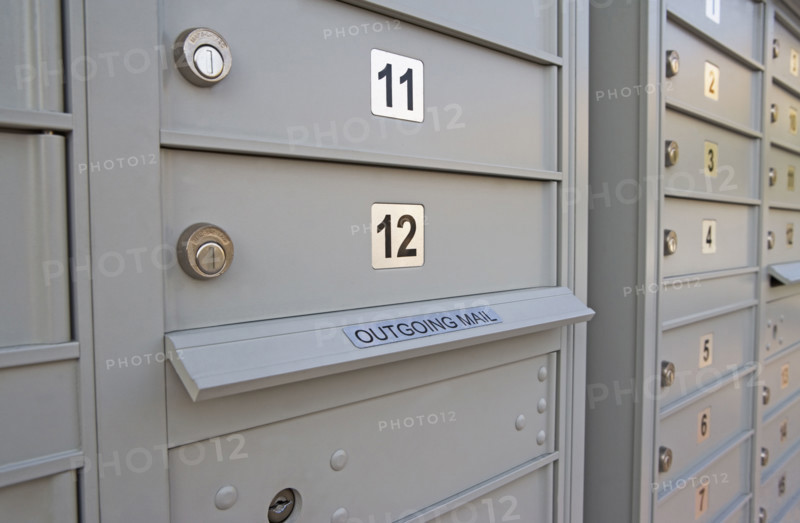 Columns of locked mailboxes. Date : 2007
