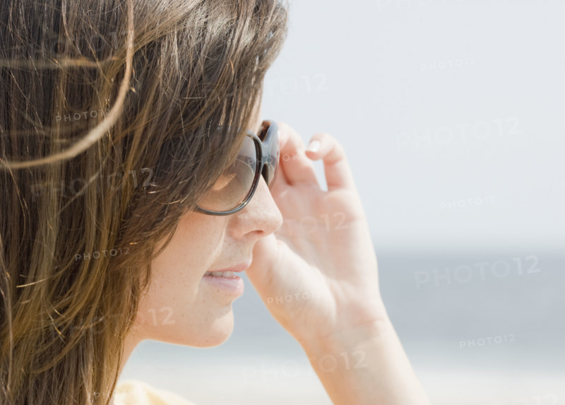 Woman wearing sunglasses. Date : 2007