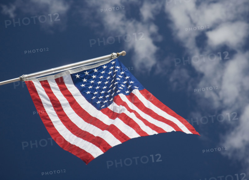 American flag under blue sky. Date : 2007