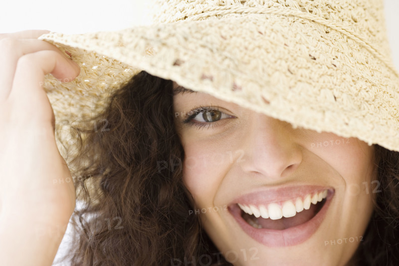 Woman wearing sunhat. Date : 2007
