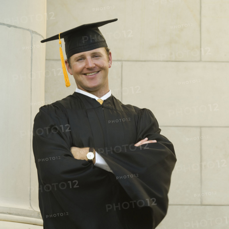 Male graduate with arms crossed. Date : 2007