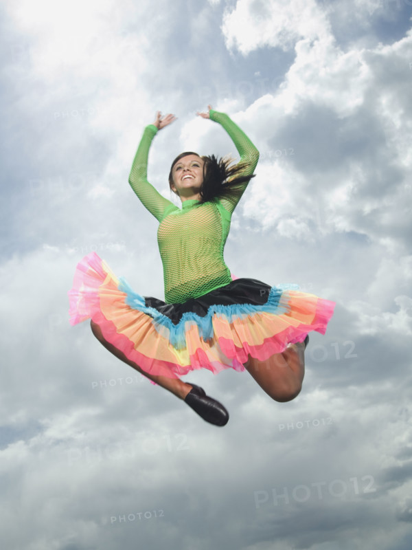 Low angle view of woman jumping. Date : 2007
