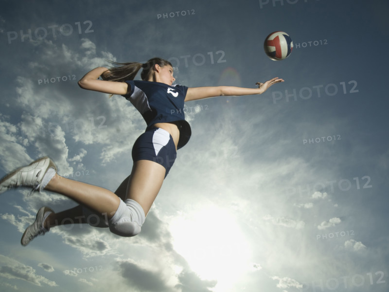 Low angle view of volleyball player jumping. Date : 2007