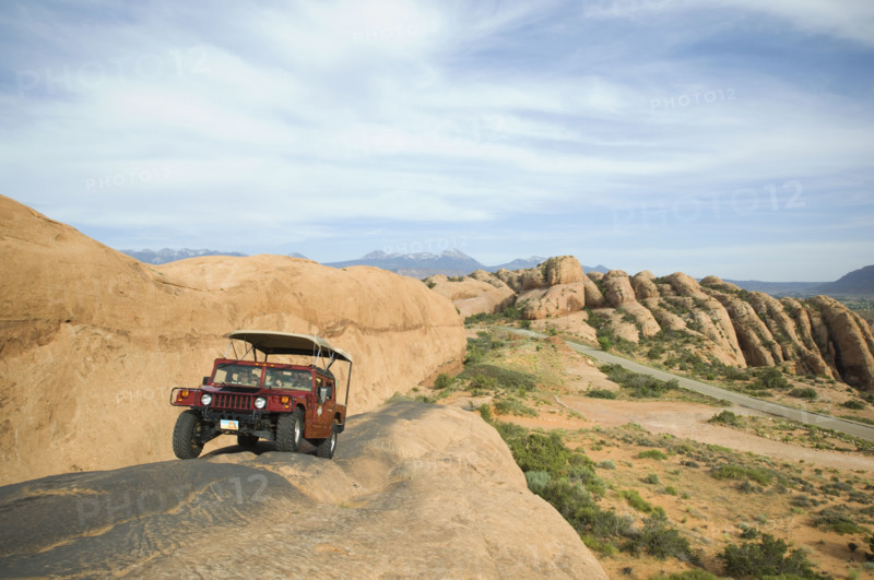 Off-road vehicle driving on rock formation. Date : 2007