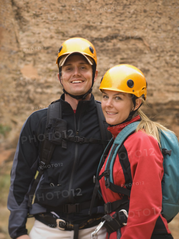 Couple wearing rappelling gear. Date : 2007
