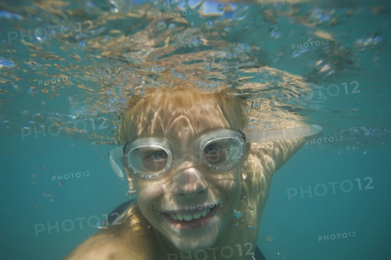 Underwater shot of boy swimming, Utah, United States. Date : 2007