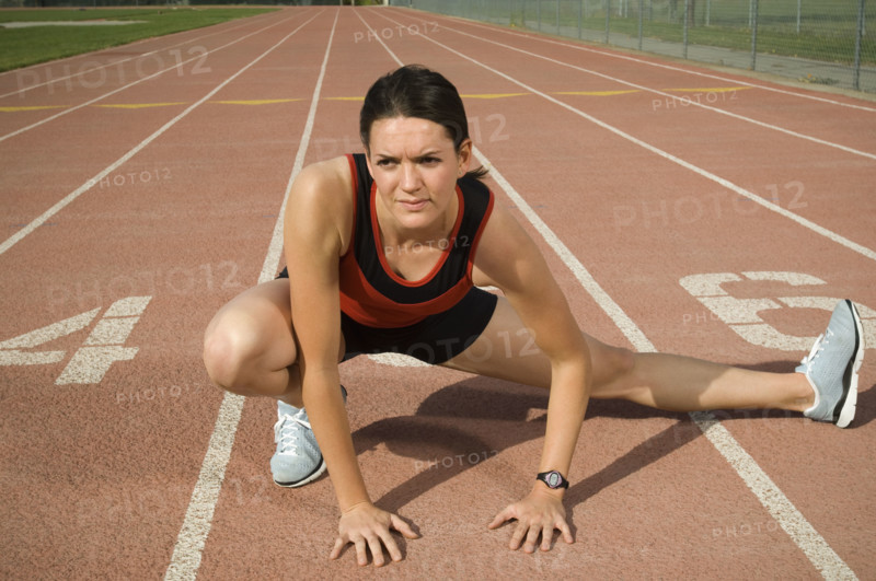 Female runner stretching, Utah, United States. Date : 2007
