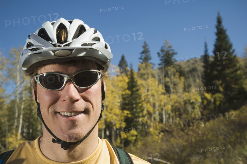 Man wearing bicycle helmet, Utah, United States. Date : 2007