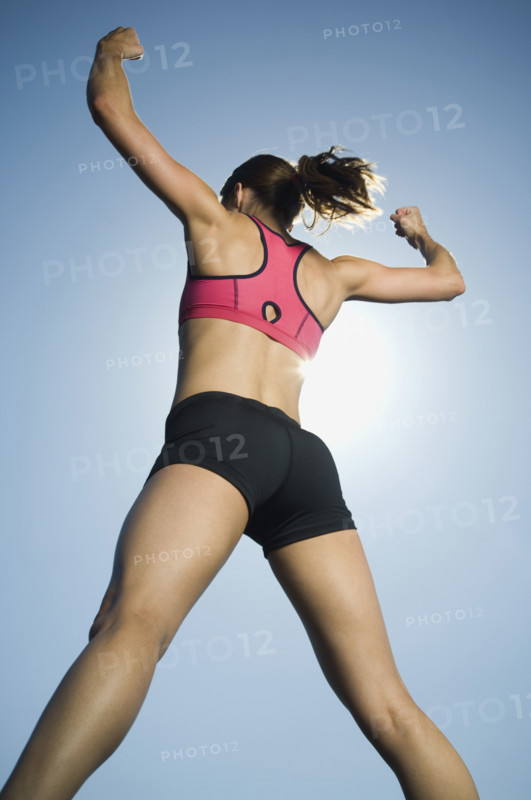 Rear view of woman in athletic gear. Date : 2007