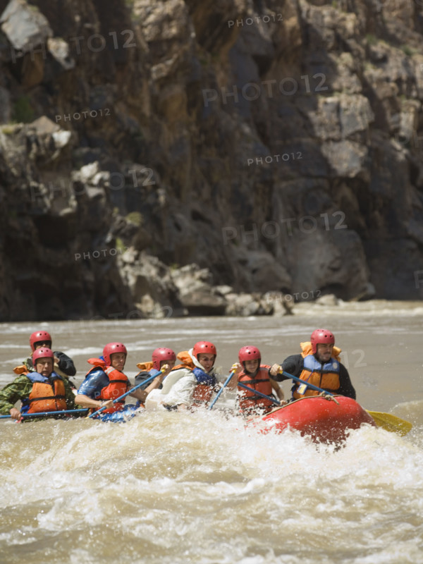 Group of people river rafting. Date : 2007