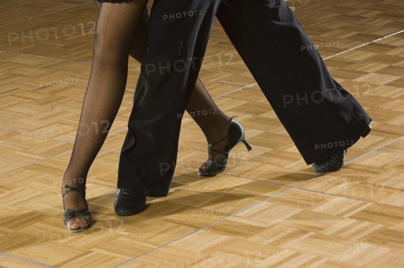 Close up of couple salsa dancing. Date : 2007