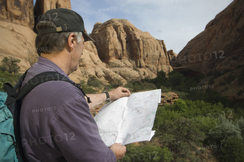 Man looking at map. Date : 2007