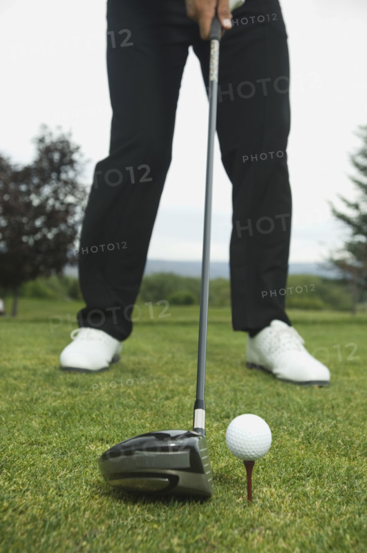 Close up of man playing golf. Date : 2007