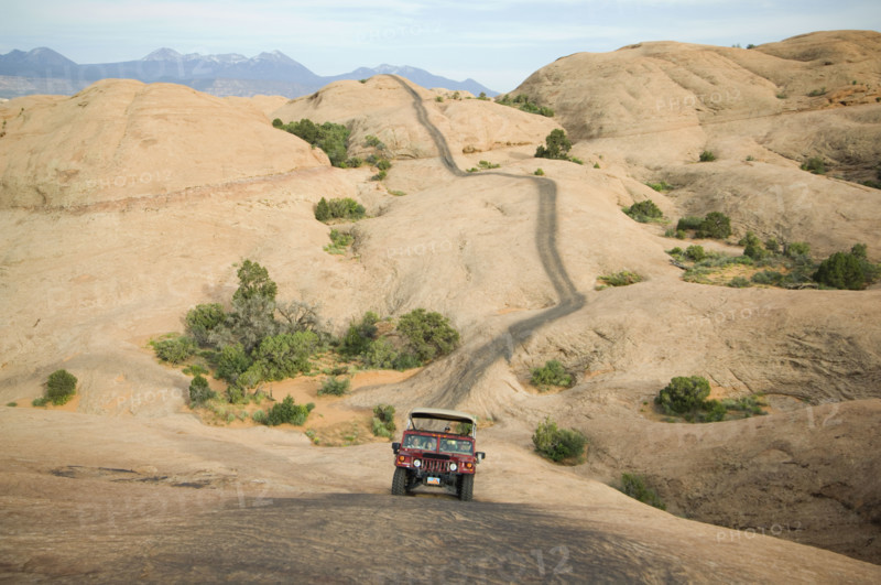 Off-road vehicle driving on rock formation. Date : 2007