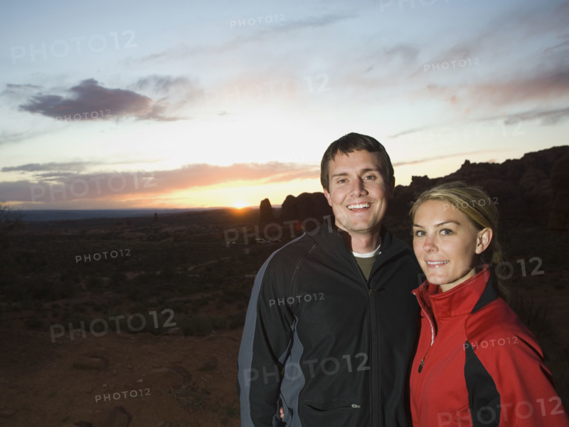 Couple in desert at dusk. Date : 2007