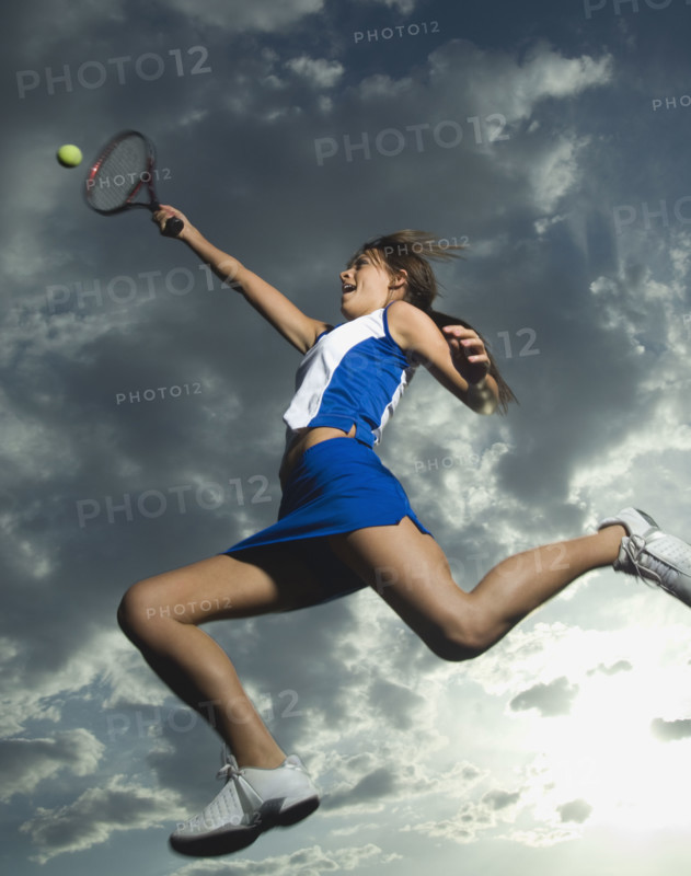 Low angle view of tennis player jumping. Date : 2007